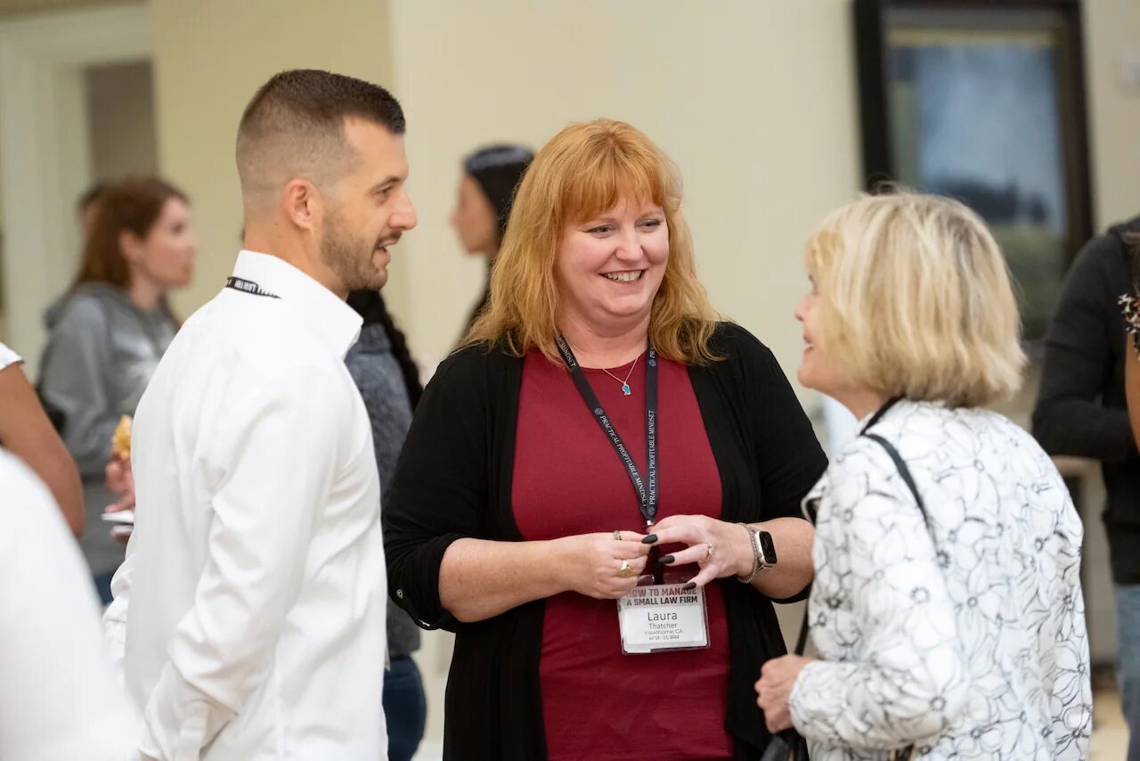 Law firm owners together at an HTM community gathering