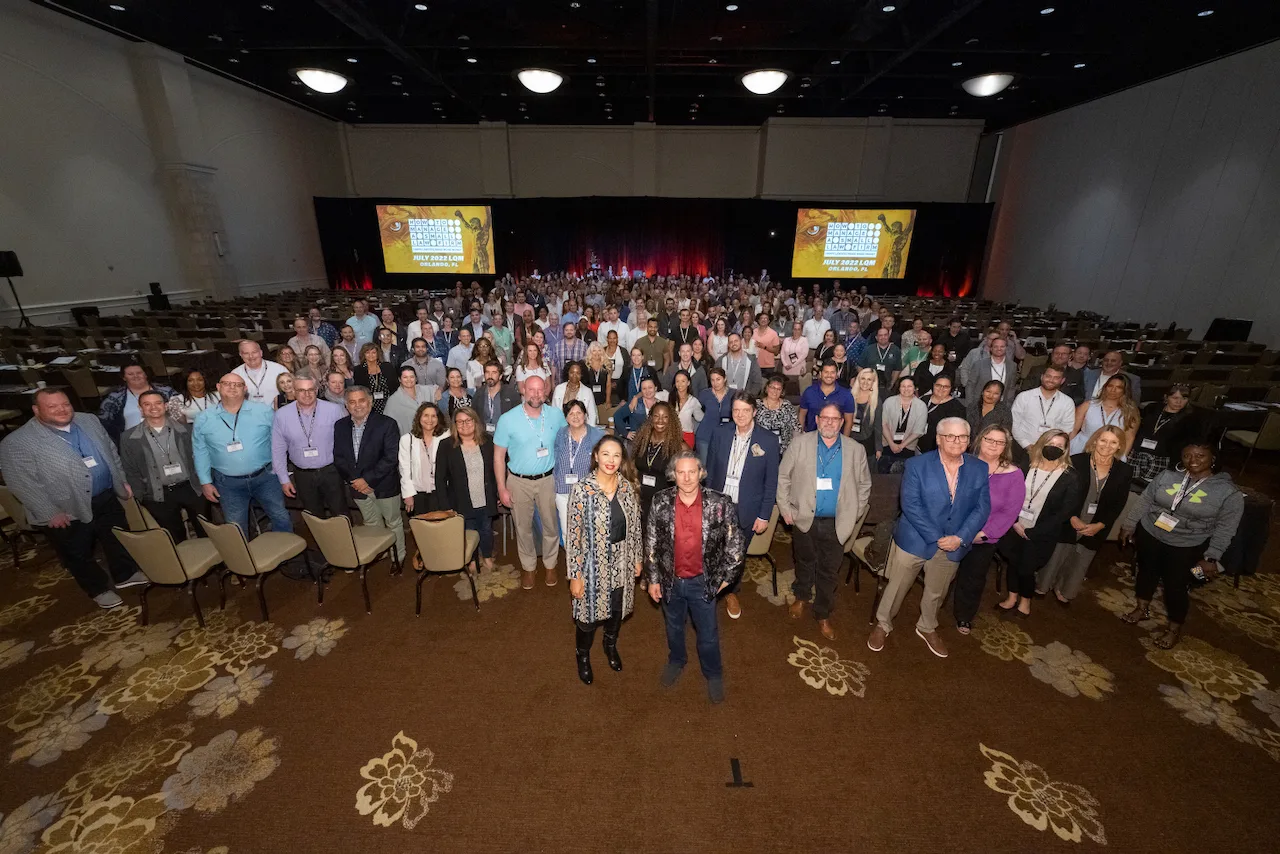 A large group of HTM members gathered for a community photo.